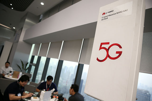 Huawei 5G device is pictured outside an exhibition in Bangkok