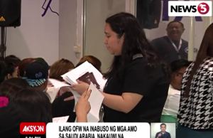 Repatriated OFWs being processed at airport