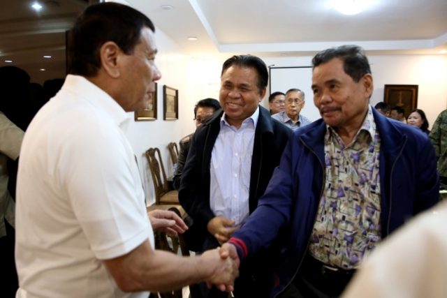 Duterte Iqbal handshake