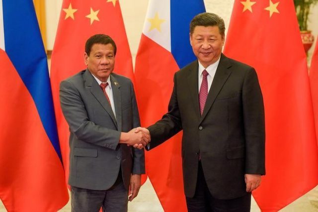 Duterte Xi handshake