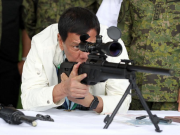 Duterte checks rifle sight