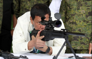 Duterte checks rifle sight
