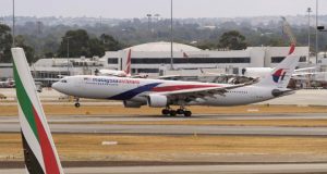A Malaysia Airlines Airbus A330 commercial flight lands at Perth International Airport