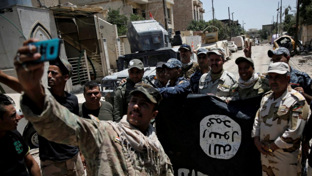 Iraqi Army units fighting Islamic State miitants in Mosul