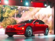 Tesla prepares to hand over first Model 3 cars, shares climb