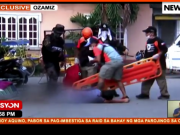 Rescuers, survivor, Ozamiz carnage