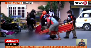 Rescuers, survivor, Ozamiz carnage
