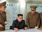 North Korea’s Kim holds off on Guam missile plan; Seoul says will prevent war