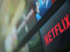 The Netflix logo is pictured on a television in this illustration photograph taken in Encinitas California