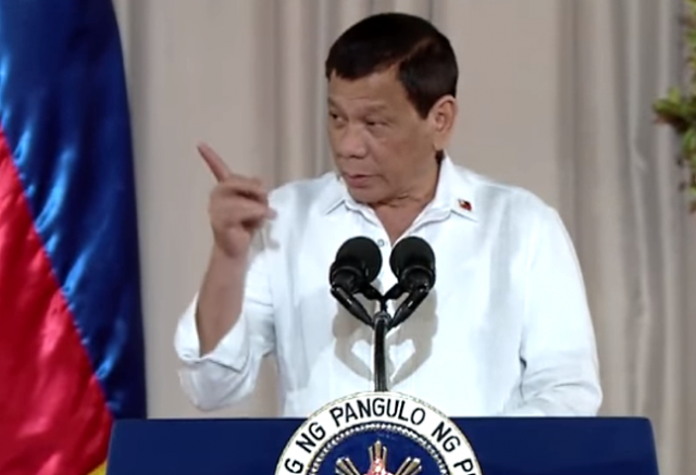 Duterte_gestures_at_podium_RTVM