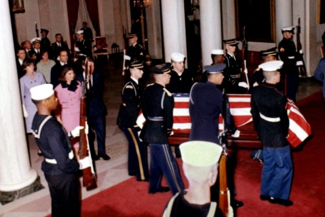 Flag-draped JFK casket