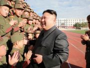 Kim Jong Un with cheering cadets