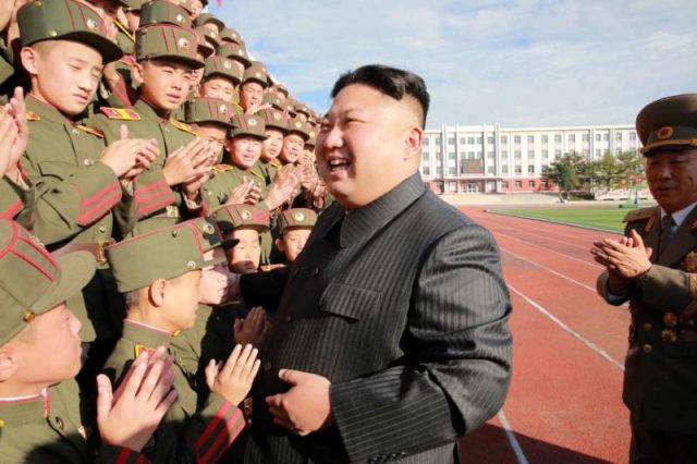 Kim Jong Un with cheering cadets