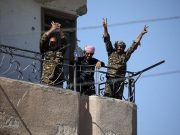 V sign in Raqqa