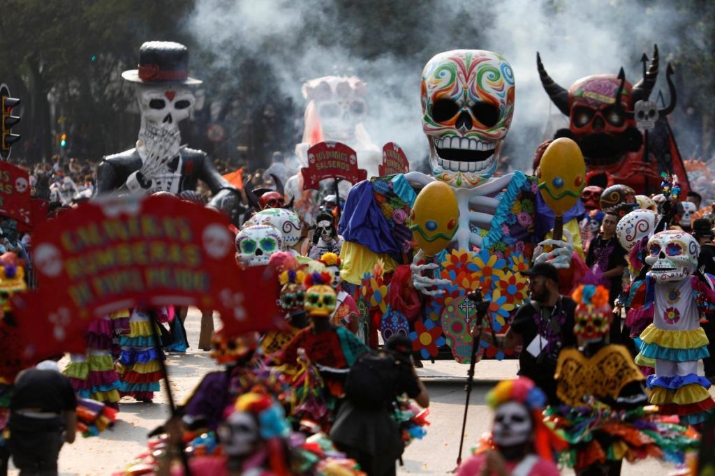 After September quakes, Mexico’s Day of the Dead parade honors rescuers