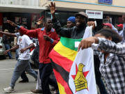 Zimbabwe’s ruling party set to sack Mugabe, sources say