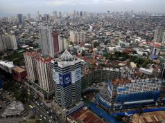Construction of new buildings alongside older establishments is seen within the business district in Makati City, metro Manila