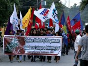 Torch-bearing Mindanao protesters converge in CDO to mark Bonifacio Day CDO_Bonifacio_Day_protest_ERWIN_MASCARINAS