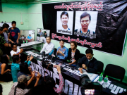 Reuters reporters held in Myanmar were handed papers by 2 cops, then arrested: families
