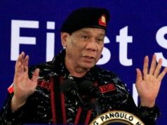 Duterte in military garb