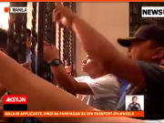 WATCH | Huge crowd jams mobile passport kiosk at Manila City Hall Jammed_passport_on_wheels_processing_Manila_News5grab
