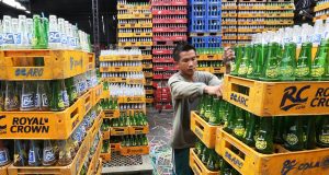 Workers for a beverage dealer in Quezon City