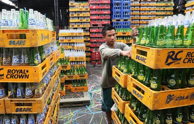 Workers for a beverage dealer in Quezon City