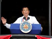 Philippine leader approves autonomy law for troubled Muslim region