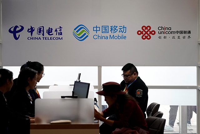 Signs of China Telecom and China Mobile and China Unicom