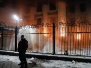 Russia seizes Ukrainian ships near annexed Crimea after firing on them Smoke from a flare thrown by a protester