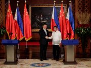 What flag protocols stand for and why they mattered during Xi Jinping’s visit China's President Xi Jinping and Philippine President Rodrigo Duterte shake hands after a joint news statement at the Malacanang presidential palace in Manila