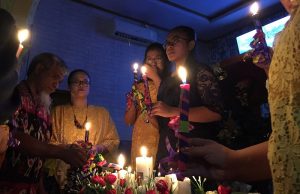 Residents affected by the tsunami attend a mass during Christmas at Carita Pentecostal Church in Pandeglang