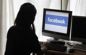A girl accessing Facebook