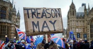 Pro-Brexit and anti-Brexit protesters demonstrate outside the Houses of Parliament in London