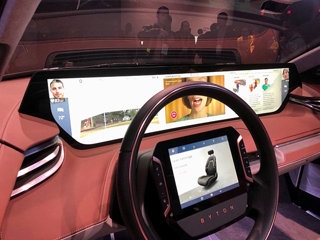The interior of Byton's M-Byte electric vehicle, featuring a massive screen, is shown after the vehicle's unveiling during the 2019 CES in Las Vegas