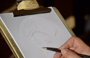 Artist sketching a figure