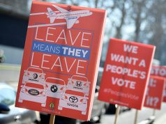 An anti-Brexit placard is seen outside of the Houses of Parliament in London, Britain