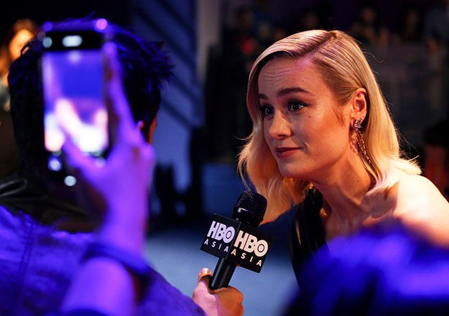 Captain Marvel cast member Brie Larson speaks to the media at a fan event in Singapore