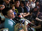 Maria Ressa with reporters