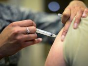 US soldier being vaccinated