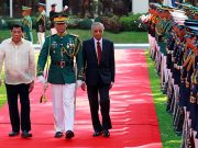 Philippine President Rodrigo Duterte and Malaysian Prime Minister Mahathir Bin Mohamad are seen marching together at the Malacanang presidential palace in Manila