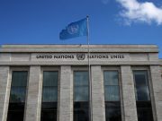 A flag is pictured outside the European headquarters of the United Nations in Geneva