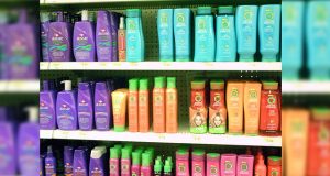 Shampoo bottles in a rack