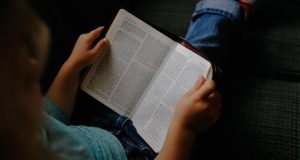 Person reading Bible