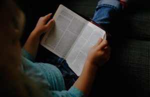 Person reading Bible