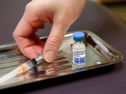A vial of the measles, mumps, and rubella (MMR) vaccine is pictured at the International Community Health Services clinic in Seattle