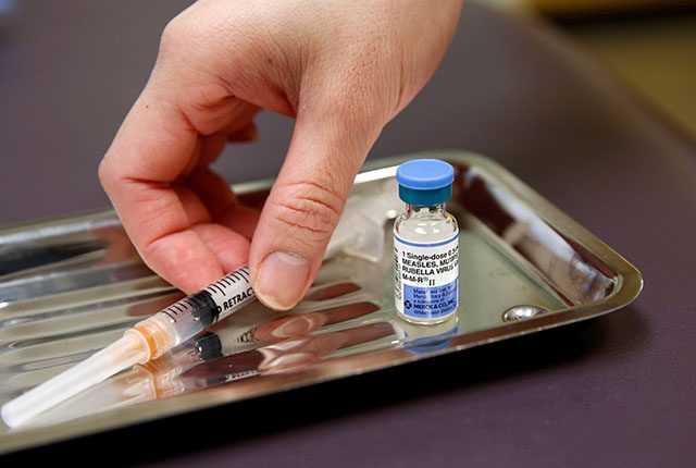 A vial of the measles, mumps, and rubella (MMR) vaccine is pictured at the International Community Health Services clinic in Seattle