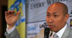 Gary Alejano gestures while speaking