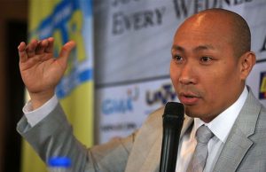 Gary Alejano gestures while speaking