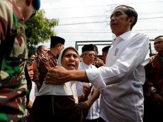 Joko Widodo embraces his supporters